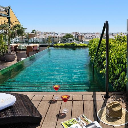 Hotel Lobby Seville Exterior photo Rooftop pool
