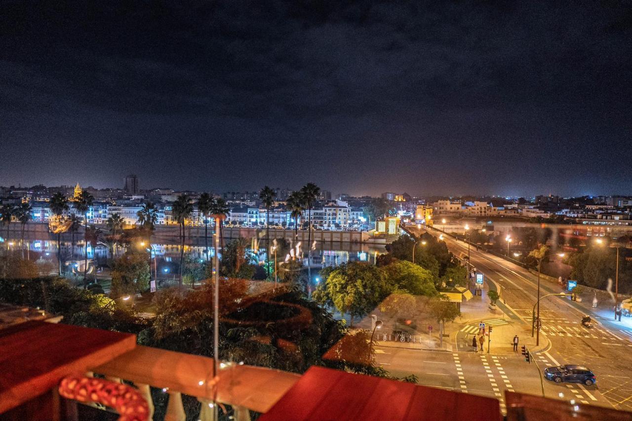 Hotel Lobby Seville Exterior photo Rabat at night