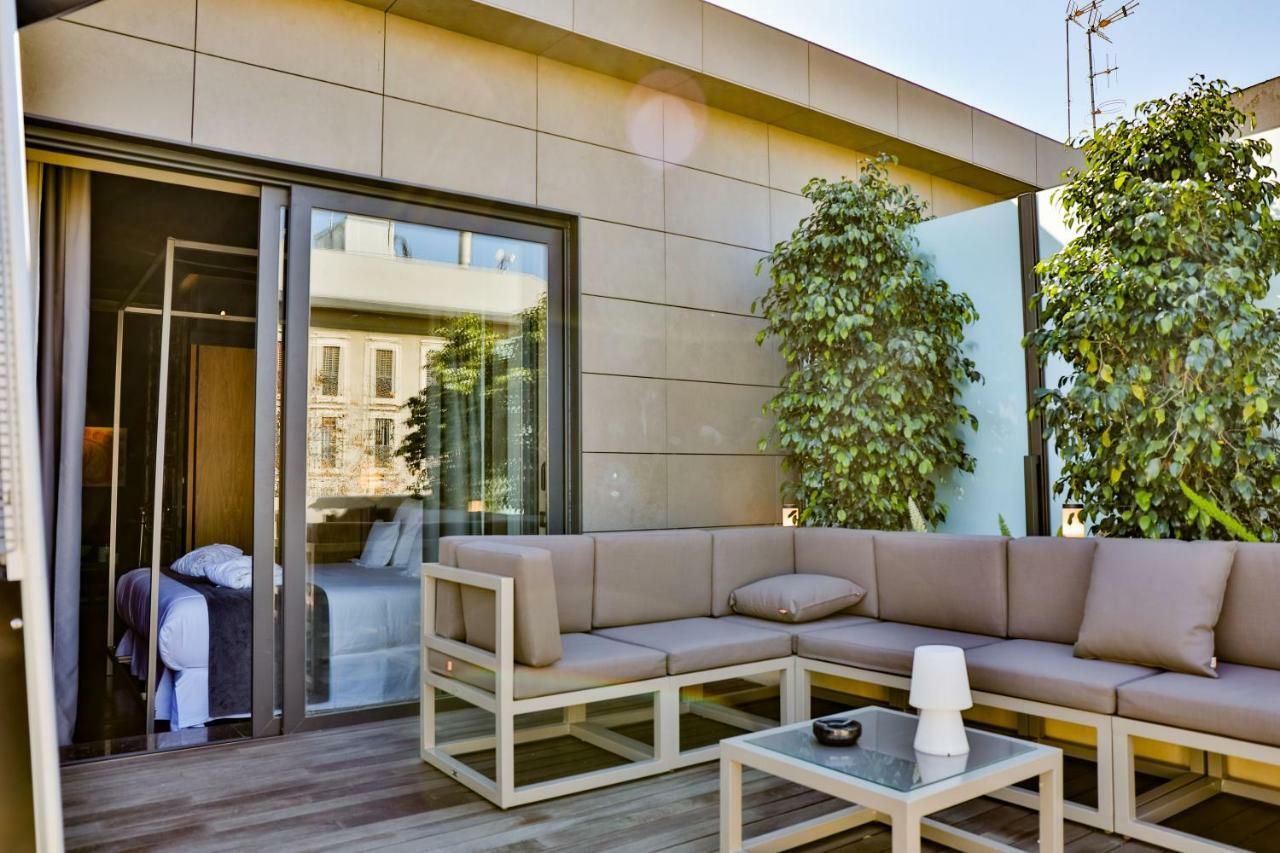 Hotel Lobby Seville Exterior photo The hotel's rooftop